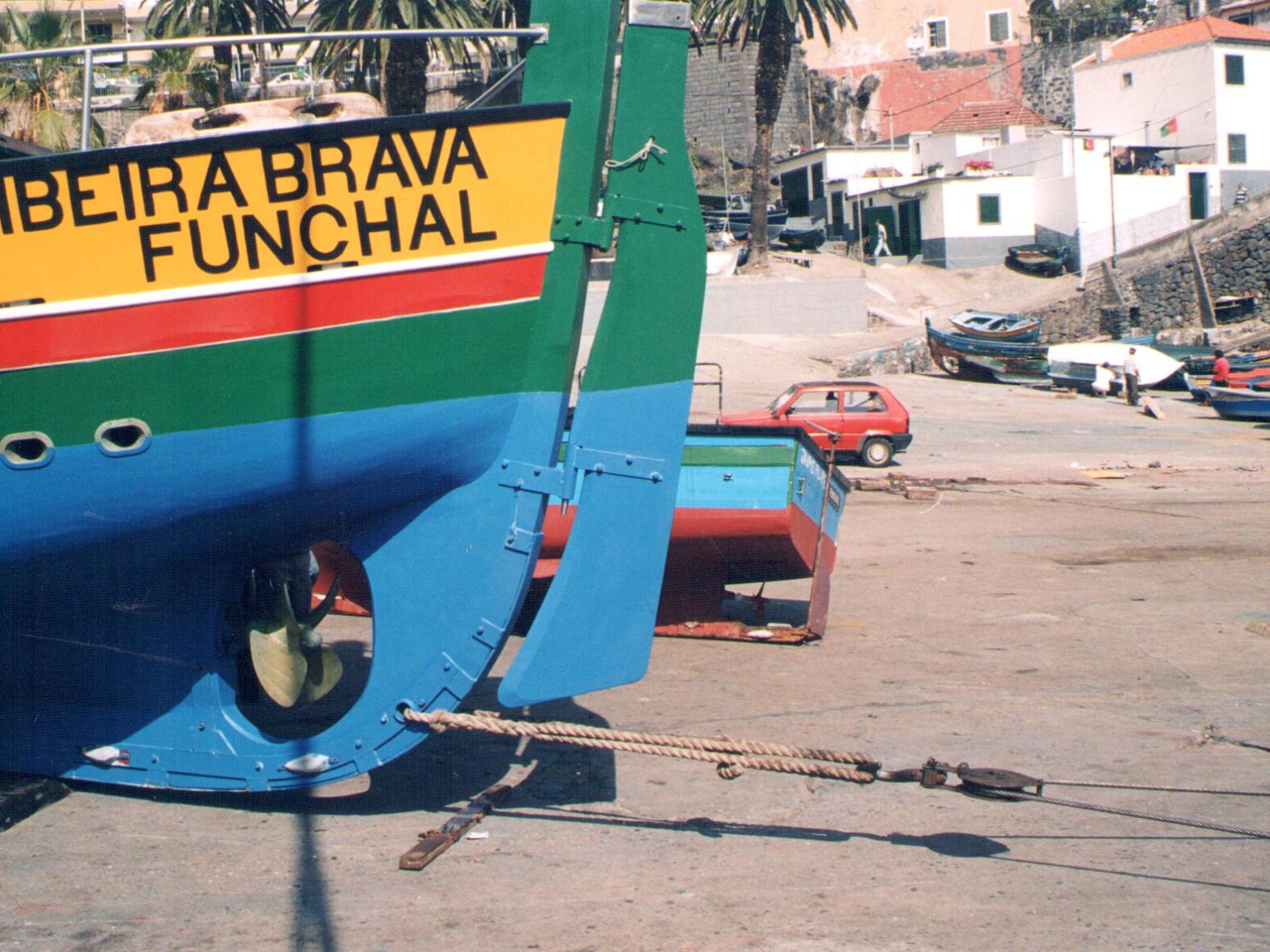 a boat parked on the side of a building